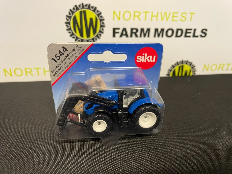 SIKU 1544 1:87 SCALE NEW HOLLAND WITH FRONT LOADER AND PALLET FORKS - Image 1 of 1
