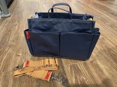 Nueva bolsa de pañales Storksak Stork Sak azul con correa Foto 1 de 4