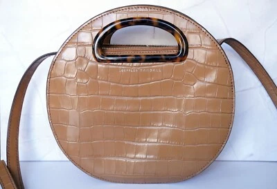 Bolso circular en relieve Loeffler Randall Indy  Foto 1 de 4