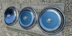 Lot Of (3) 1976/77/78 ? Cadillac Eldorado Hubcaps Blue Emblem OEM Driver Cond. - Picture 1 of 8