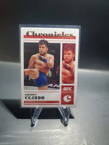 Henry Cejudo /299 Bronze. 2023 Panini Chronicles UFC 