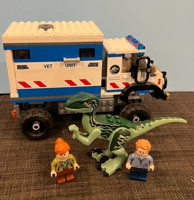 lego jurassic world raptor rampage 75917 99% completo con 2 de los 3 higos Foto 1 de 3