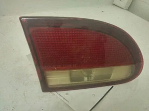 DRIVER LEFT TAIL LIGHT LID MOUNTED FITS 95-99 CAVALIER 121000 - Picture 1 of 3