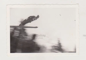 Affectionate Handsome Young Man Skier Ski Jumping Blur People Unusual Snapshot - Picture 1 of 7