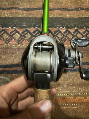 Carrot Stick Fishing Rod With Bass Pro Shop Baitcaster Reel - Image 1 of 4