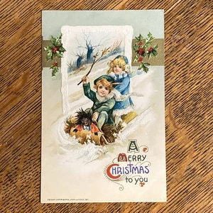 Black Doll CHILDREN Boy Girl Sledding CHRISTMAS Vtg Antique Winsch Postcard! - Picture 1 of 5