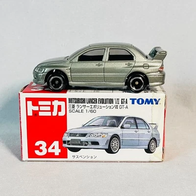 Tomica 2002 Tomy 34 Mitsubishi Lancer Evolution con caja de banda "roja" ¡Como nuevo! Foto 1 de 4