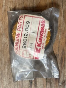 KAWASAKI KE250 KE175 KE125 F6 F7 G5 KLR250 G4TR 28012-009 REFLEX REFLECTOR N.O.S - Bild 1 von 2