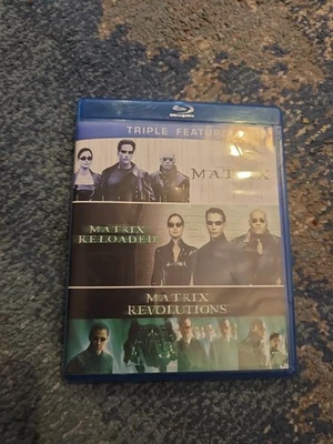 The Matrix / Matrix Reloaded / Matrix Revolutions 3-Disc Blu-ray Trilogy Set - Image 1 of 4