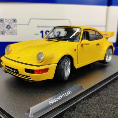 AUTO SOLIDA PORSCHE 911 (964) 3.8 RS GIALLO 1990 1:18 NUOVA SCATOLA S1803401 - Immagine 1 di 4