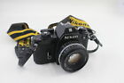 Appareil photo argentique vintage Nikon EM, REFLEX fonctionnant avec objectif Nikon Nikkor 50 mm F/1,8