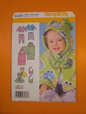 SIMPLICITY PATTERN 4434 BABIES' TOP, PANTS, CAPLET, BIB & BLANKET WRAP - Image 1 of 3