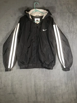 Chaqueta cortavientos vintage Nike negra con capucha talla mediana años 90 ropa de calle usada Foto 1 de 4
