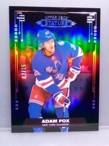 2021-22 Upper Deck Statura #16 ADAM FOX Nero 12/15 SP Rangers - Foto 1 di 7