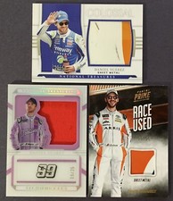 2018 Prime/2022 N.T. Daniel Suarez Race Used Sheet Metal and Firesuit, (3) Cards