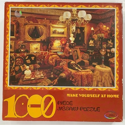 Ceaco Make Yourself At Home 1000 Piece 27" x 20" Puzzle: NEW / SEALED - Ages 12+ - Image 1 of 3
