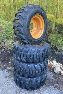 4-12X16.5 SKS-1 Tires/Rims for Case 1845, 1845C, XT & 400 series-12-16.5-14PLY - Picture 1 of 8