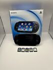 Boxed Ps Vita PCH-1003 OLED Crystal Black with 4GB memory card and 5 Games