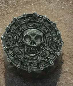 Disney 1.5" Metal Silver Toned Coin Medallion Pirates of Caribbean Aztec Skull - Picture 1 of 3