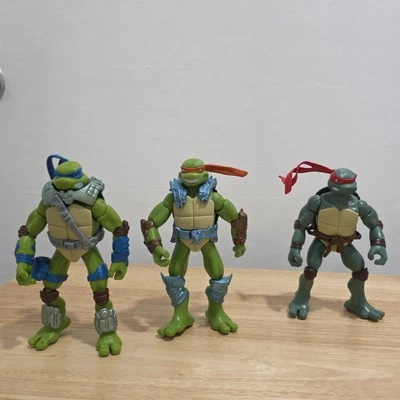 Lote de 3 figuras de acción Tortugas Ninja adolescentes mutantes TMNT 2006 Playmates Toys Foto 1 de 3