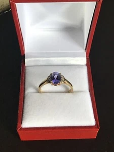 9ct GOLD DIAMONDS SET IN WHITE GOLD SHOULDERS WITH 3/4ct BLUE STONE RING (P) - Picture 1 of 9
