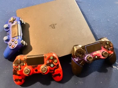 ps4 slim 1tb console used with three controlors and a head set - Image 1 of 4