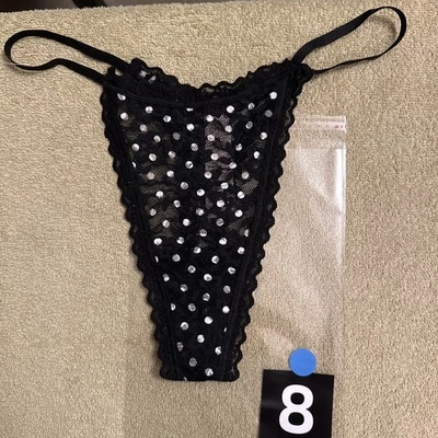 Bragas de encaje Victoria’s Secret medianas negras lunares Foto 1 de 4