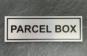 SIGNO DE CAJA DE PAQUETES / PLACA DE METAL PLATEADO CEPILLADO 150X50mm - Imagen 1 de 3