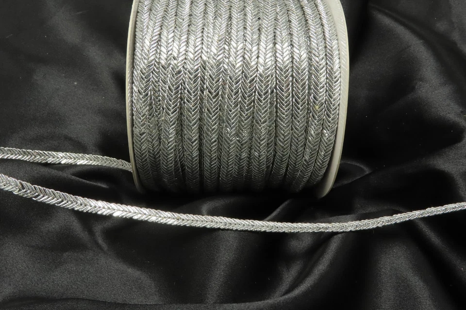 Trenza 1/4" 6 mm plata por 10 yardas borde de costura Foto 1 de 1