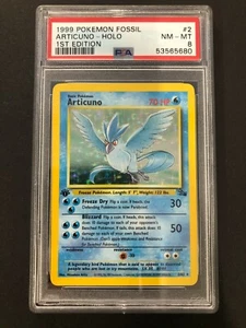 Fossil Articuno Holo 1999 PSA 8 primera edición casi como nuevo #2/62 raro Pokémon 2 - Imagen 1 de 2