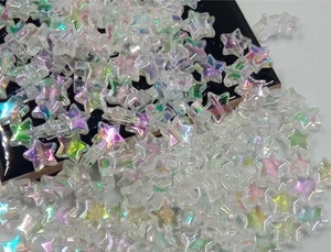 100pz perline acrilico stella  10mm colore trasparente AB bijoux - Foto 1 di 1