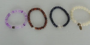 Lot de 4 marques. par Avon LOT MIXTE BRACELETS - boite neuve pas voir photo - Photo 1/7