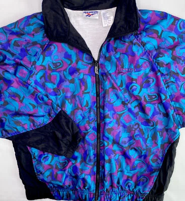 Chaqueta cortavientos Reebok vintage años 80 90 color abstracto forrada en bloques mujer talla M Foto 1 de 4