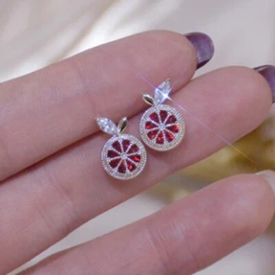 10K Yellow Gold With Simulated Ruby & Moissanite Orange Shape Stud Earrings - Image 1 of 3