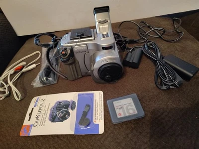 Vintage Canon Optura Mini DV and Accessories - Untested  - Image 1 of 4