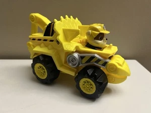 Paw Patrol Dino Rescue Rubble’s Deluxe Rev Up Veicolo e Figura - Foto 1 di 4