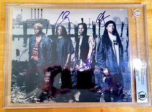 CHIPPED CAPSUL LIVING COLOUR SIGNED 8X10 PHOTO BECKETT BAS COA AUTO AUTOGRAPH F7 - Picture 1 of 5