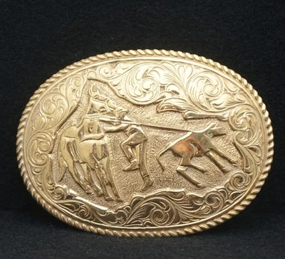 WA25174 *NOS* VINTAGE AÑOS 70 **CATTLE WRANGLER** HEBILLA DE CINTURÓN DE BRONCE CUERDA DE BECERRO Foto 1 de 2