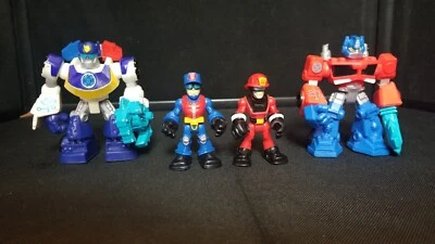 Playskool Rescue Bots Optimus Prime Chase Chief Cody Burns figure 4 lot Hasbro - Image 1 of 4