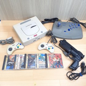 Sega Saturn console with Fighting Virtua Stick, Virtua Gun controller & 5 Games