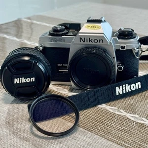 Nikon FG-20 with 50mm f/1.8 Lens, Filter, and Nikon Strap; All Functions Working - Picture 1 of 9