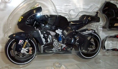 Minichamps 1/12 Scale 122 110876 Ducati Desmosedici Valencia test 2010 Rossi - Image 1 of 3