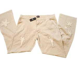 boohoo MAN Star Embroidered Sand Skinny Flare Applikation Hose Herren Gr. 34R Boho - Bild 1 von 20