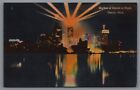 Postcard MI Skyline of Detroit at Night Illuminated Detroit River Michigan C7