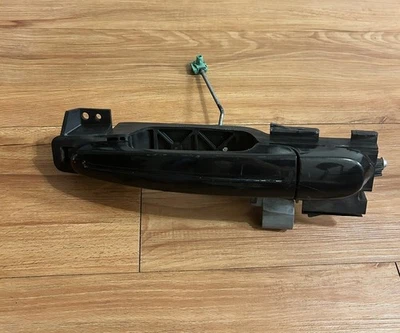 Conjunto de manija de puerta exterior lado pasajero trasero derecho Ford Taurus 2010-2012 OEM Foto 1 de 4