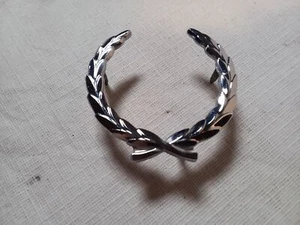 1985 CADILLAC FLEETWOOD BROUGHAM CHROME METAL SAIL PANEL WREATH EMBLEM #7643400 - Picture 1 of 4