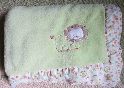 Manta bebé león borde lunares círculos bronceados naranja SumerSault EU Foto 1 de 3