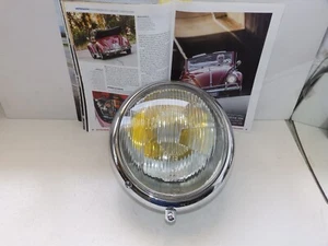 VOLKSWAGEN 1.2 CABRIOLET DEL 61- FARO DX = SX COMPLETO DI CORNICE BOSCH - Imagen 1 de 3