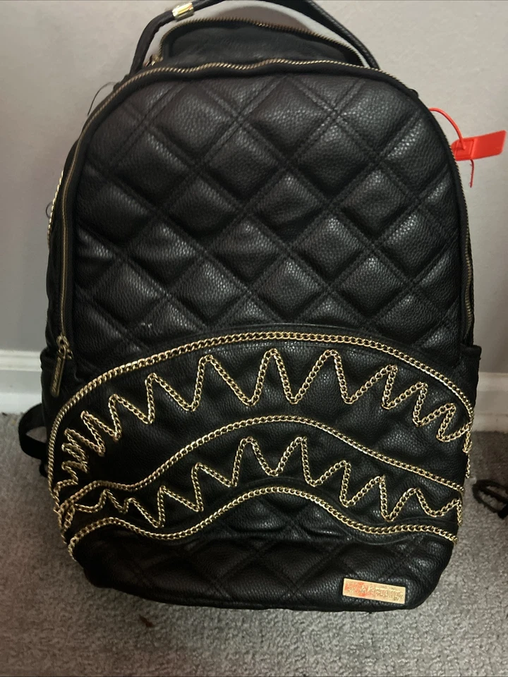 Mochila Sprayground Noir Quilt Cadena Dorada Tiburón (DLVX) Foto 1 de 4