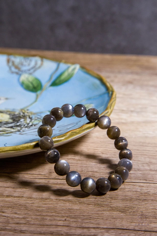 Pulsera con cuentas de piedra solar negra natural de alta calidad de 11 mm | 黑骨干手串 Foto 1 de 4